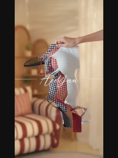 チェック柄エアサポブラのディテールがわかる動画シーン。通気ホールと柔らかい質感を紹介。